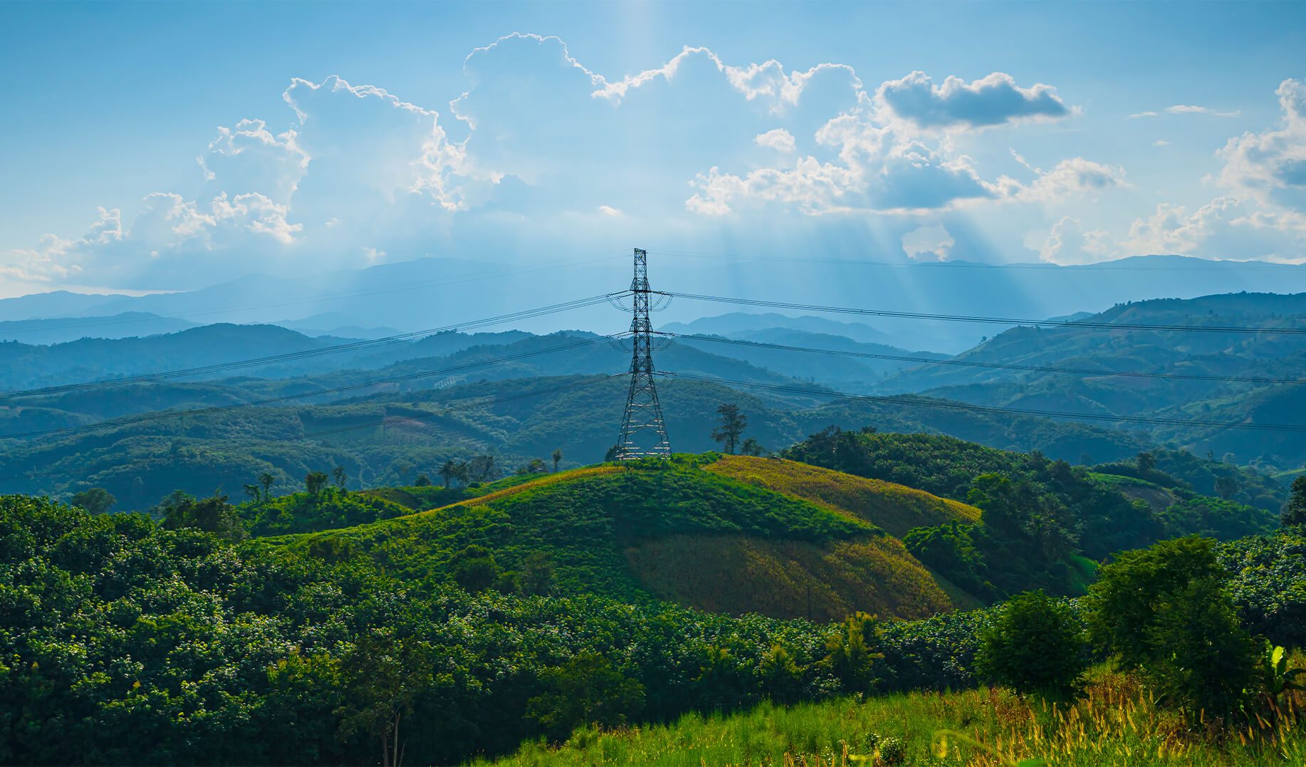 Picturesque landscape scene, Power line pylon in mountainous area